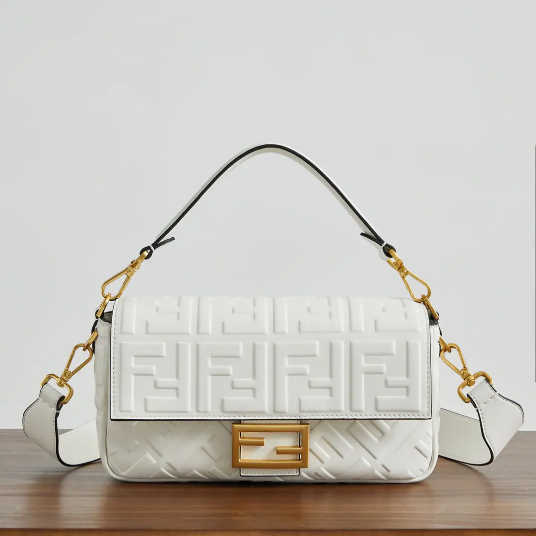 BaguetteHandbag. Black leather handbag. More details Iconic BaguetteMedium Handbag, Black Napa soft leather., It's three-dimensional.FFPattern. by whichFFTights.. It's got a front cap., Magnetic buttons, Internal partition with lined, Label bags and gold metal pieces. The handbags are equipped with disassembly handles and shoulder belts., But the handy., Shoulder or slash. Italian manufacture Material: %Lamb skin., Uchi.: Cotton Depth: 6Length: 27Height: 15 Paragraph