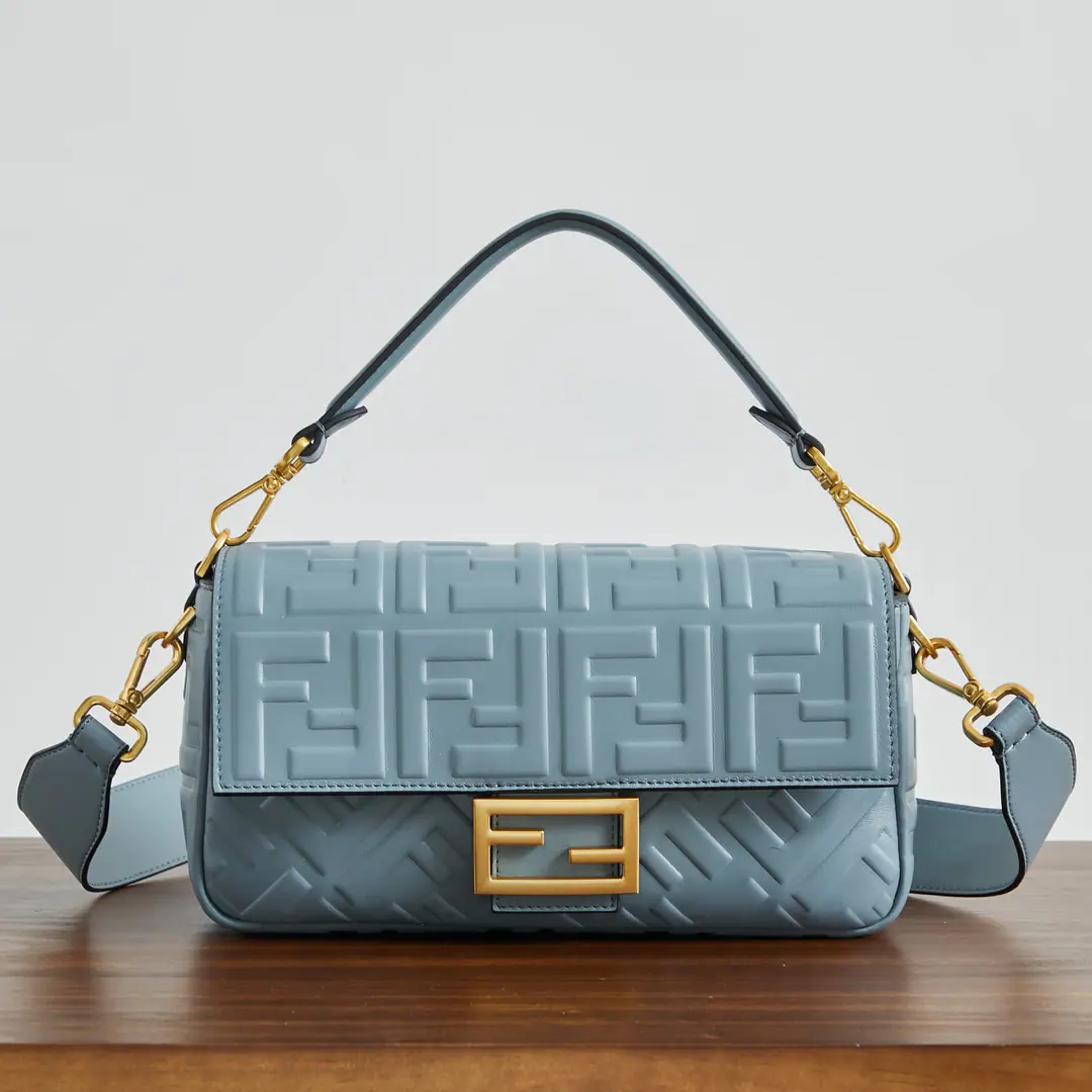 BaguetteHandbag. Black leather handbag. More details Iconic BaguetteMedium Handbag, Black Napa soft leather., It's three-dimensional.FFPattern. by whichFFTights.. It's got a front cap., Magnetic buttons, Internal partition with lined, Label bags and gold metal pieces. The handbags are equipped with disassembly handles and shoulder belts., But the handy., Shoulder or slash. Italian manufacture Material: %Lamb skin., Uchi.: Cotton Depth: 6Length: 27Height: 15 Paragraph