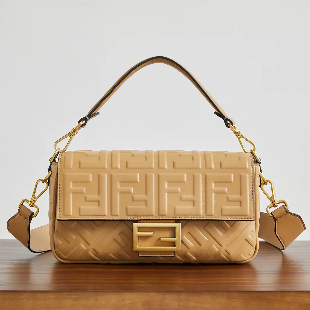 BaguetteHandbag. Black leather handbag. More details Iconic BaguetteMedium Handbag, Black Napa soft leather., It's three-dimensional.FFPattern. by whichFFTights.. It's got a front cap., Magnetic buttons, Internal partition with lined, Label bags and gold metal pieces. The handbags are equipped with disassembly handles and shoulder belts., But the handy., Shoulder or slash. Italian manufacture Material: %Lamb skin., Uchi.: Cotton Depth: 6Length: 27Height: 15 Paragraph