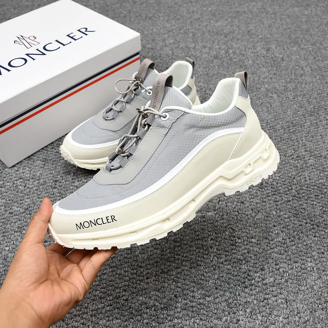 P👟👟👟 MonclerA man with a sneakers outside., It's a very comfortable, slitic feature., It's for outdoors or urban walks.. Both innovation and innovation, Function as one with graphic details, I'm inspired by the high mountain atmosphere., Explanatory fashion.. A multiplicity of original materials is integrated, Shoes face design using shoelaces and rubber embedded, The big bottom is so light., Very resilient and durable., Make it more comfortable.！39-44(38and45Do it.)5️⃣Colour Optional