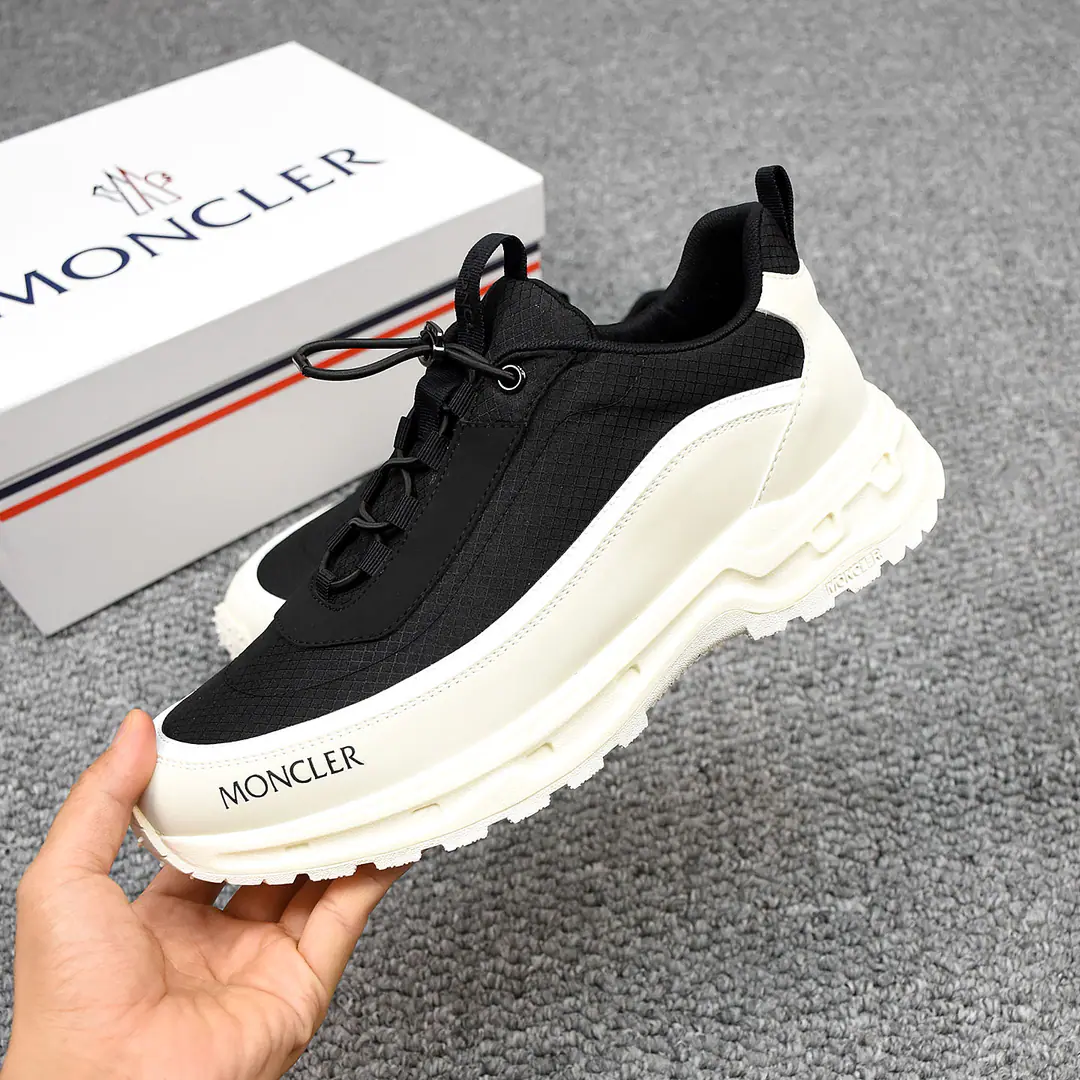 P👟👟👟 MonclerA man with a sneakers outside., It's a very comfortable, slitic feature., It's for outdoors or urban walks.. Both innovation and innovation, Function as one with graphic details, I'm inspired by the high mountain atmosphere., Explanatory fashion.. A multiplicity of original materials is integrated, Shoes face design using shoelaces and rubber embedded, The big bottom is so light., Very resilient and durable., Make it more comfortable.！39-44(38and45Do it.)5️⃣Colour Optional