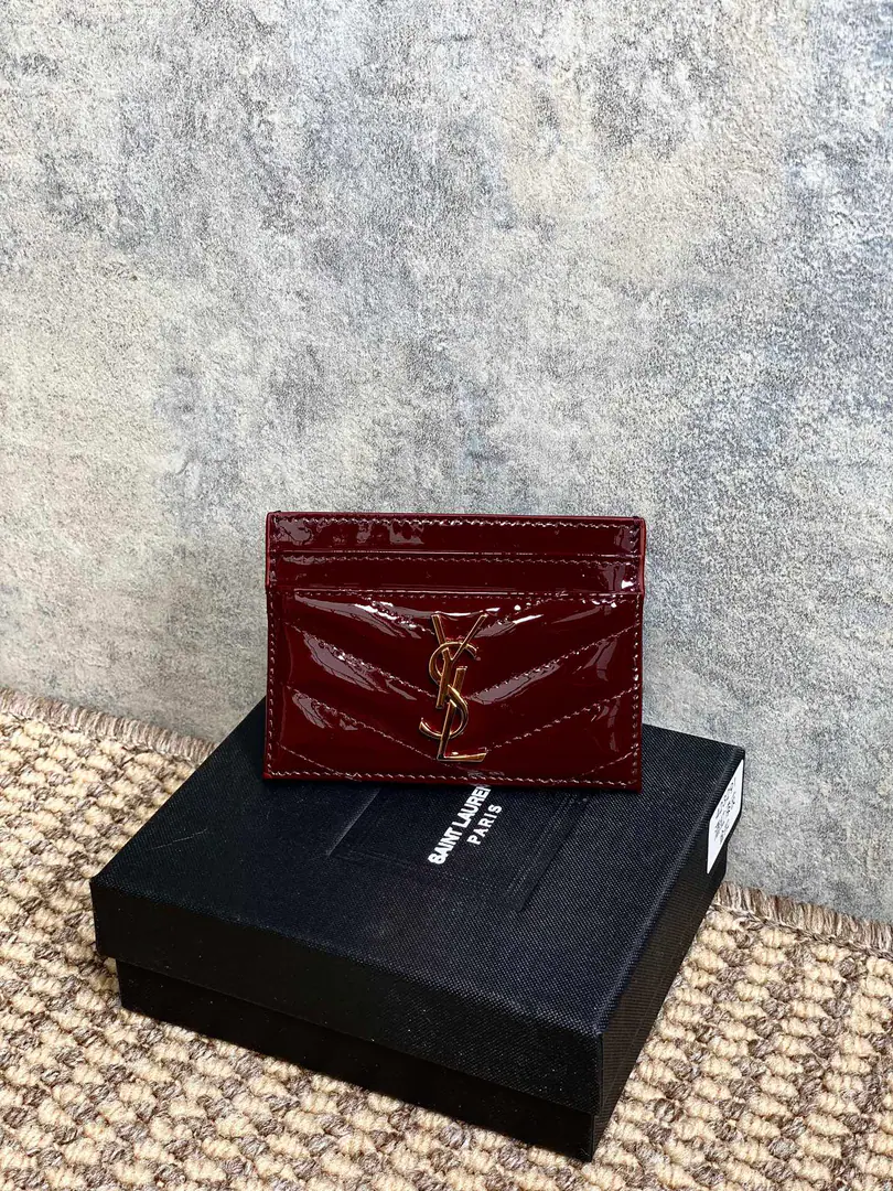P YSL San Roland.logoPainted skin, stitched-up bag., Dimensions10.5x7.5cmEncoding423291