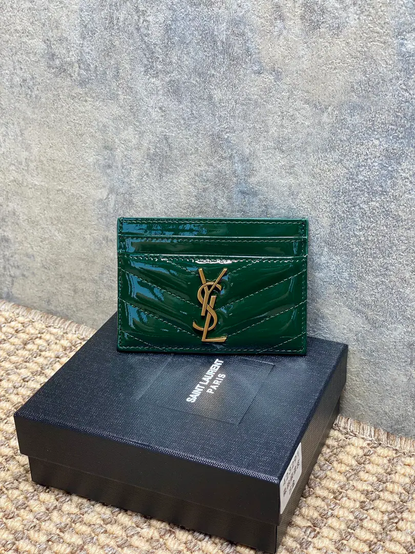 P YSL San Roland.logoPainted skin, stitched-up bag., Dimensions10.5x7.5cmEncoding423291