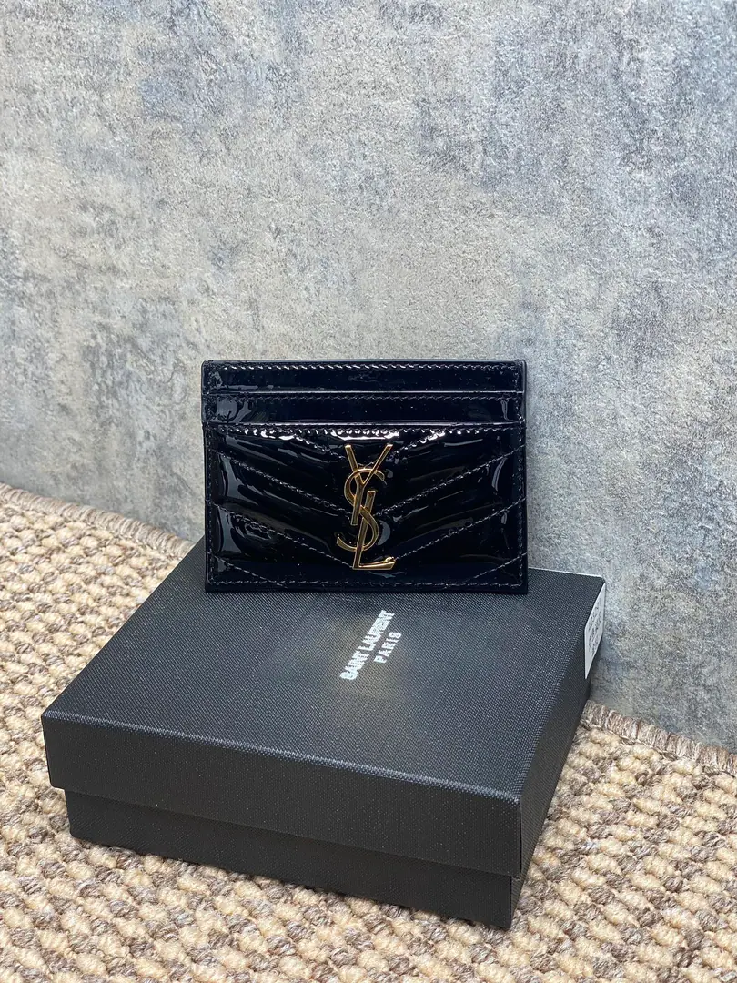 P YSL San Roland.logoPainted skin, stitched-up bag., Dimensions10.5x7.5cmEncoding423291